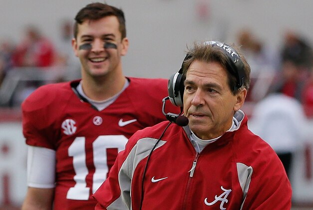 TUSCALOOSA, AL - NOVEMBER 23: Head coach Nick Saban of the Alabama Crimson Tide walks away from AJ McCarron #10 in the final mintues of their 49-0 win over the Chattanooga Mocs at Bryant-Denny Stadium on November 23, 2013 in Tuscaloosa, Alabama. (Photo by Kevin C. Cox/Getty Images) TUSCALOOSA, AL - NOVEMBER 23: Head coach Nick Saban of the Alabama Crimson Tide walks away from AJ McCarron #10 in the final mintues of their 49-0 win over the Chattanooga Mocs at Bryant-Denny Stadium on November 23, 2013 in Tuscaloosa, Alabama. (Photo by Kevin C. Cox/Getty Images)