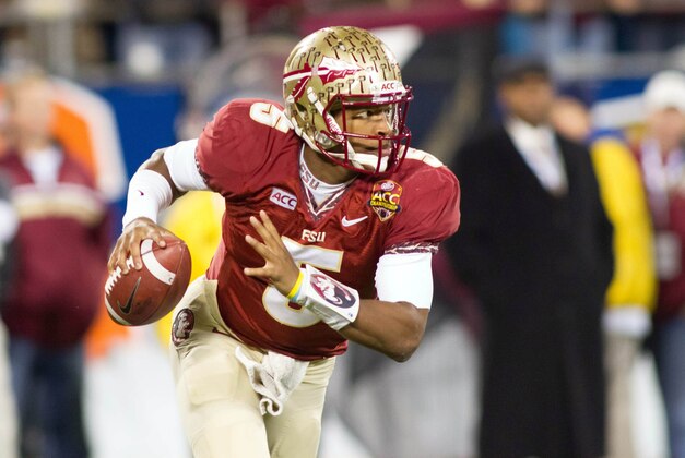 Dec 7, 2013; Charlotte, NC, USA; Florida State Seminoles quarterback Jameis Winston (5) runs the ball during the first quarter against the Duke Blue Devils at Bank of America Stadium. Mandatory Credit: Jeremy Brevard-USA TODAY Sports