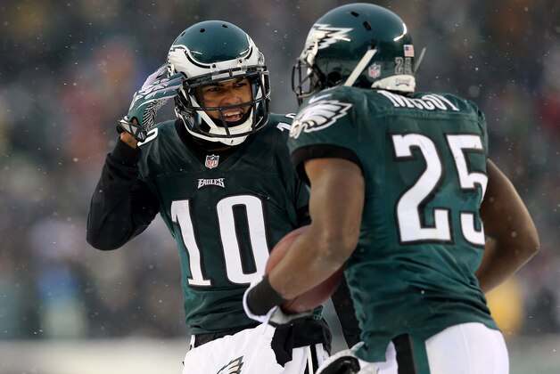 PHILADELPHIA, PA - DECEMBER 08:  DeSean Jackson #10 of the Philadelphia Eagles congratulates teammate LeSean McCoy #25 after McCoy scored a touchdown against the Detroit Lions on December 8, 2013 at Lincoln Financial Field in Philadelphia, Pennsylvania.The Philadelphia Eagles defeated the Detroit Lions 34-20.  (Photo by Elsa/Getty Images)