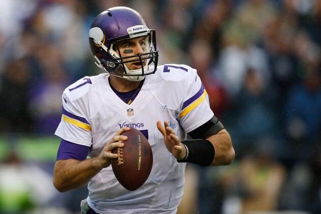 SEATTLE, WA - NOVEMBER 17:  Quarterback Christian Ponder #7 of the Minnesota Vikings rolls out to pass against the Seattle Seahawks at CenturyLink Field on November 17, 2013 in Seattle, Washington.  (Photo by Otto Greule Jr/Getty Images)