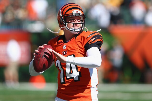 CINCINNATI, OH - SEPTEMBER 22:  Andy Dalton #14 of the Cincinnati Bengals throws a pass before the NFL game against the Green Bay Packers at Paul Brown Stadium on September 22, 2013 in Cincinnati, Ohio.  (Photo by Andy Lyons/Getty Images)