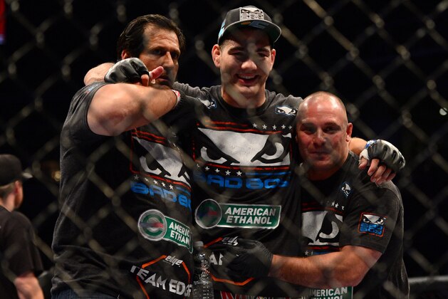 July 11, 2012; San Jose, CA, USA; Chris Weidman (center) celebrates with his team after defeating Mark Munoz (not pictured) in the middleweight bout of the UFC on Fuel TV at HP Pavilion. Mandatory Credit: Kyle Terada-USA TODAY Sports