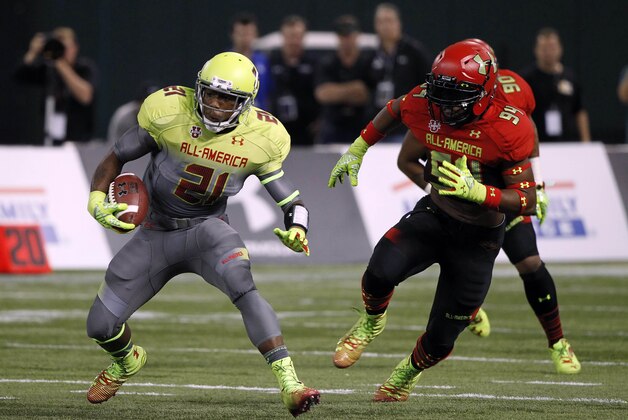 Jan 2, 2014; St. Petersburg, FL, USA; Team Nitro running back Jeff Jones (21) runs with the ball during the first half in the Under Armour All America football game at Tropicana Field. Mandatory Credit: Kim Klement-USA TODAY Sports