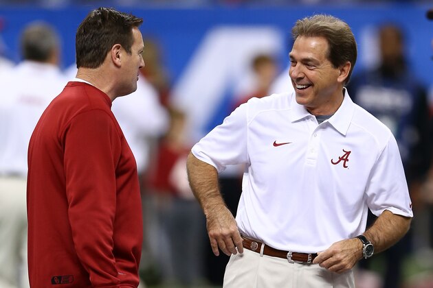 NEW ORLEANS, LA - JANUARY 02:  Head coach Bob Stoops of Oklahoma Sooners talks with Nick Saban head coach of the Alabama Crimson Tide prior to the Allstate Sugar Bowl at the Mercedes-Benz Superdome on January 2, 2014 in New Orleans, Louisiana.  (Photo by Streeter Lecka/Getty Images)