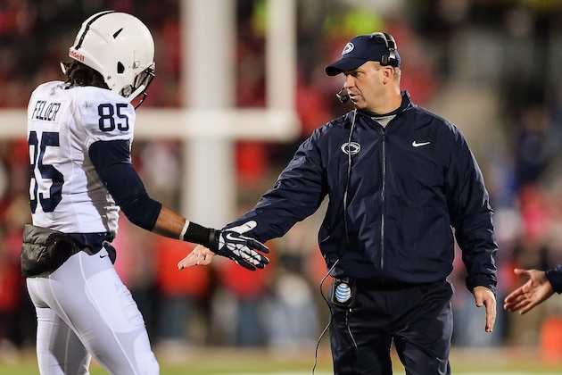 COLUMBUS, OH - OCTOBER 26:  Head coach Bill O'Brien of the Penn State Nittany Lions congratulates players after a touchdown against the Ohio State Buckeyes at Ohio Stadium on October 26, 2013 in Columbus, Ohio.  (Photo by Jamie Sabau/Getty Images)