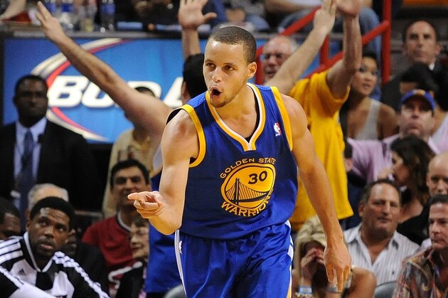 Jan 2, 2014; Miami, FL, USA; Golden State Warriors point guard Stephen Curry (30) reacts after making a three point basket during the second half against the Miami Heat at American Airlines Arena. Mandatory Credit: Steve Mitchell-USA TODAY Sports Jan 2, 2014; Miami, FL, USA; Golden State Warriors point guard Stephen Curry (30) reacts after making a three point basket during the second half against the Miami Heat at American Airlines Arena. Mandatory Credit: Steve Mitchell-USA TODAY Sports