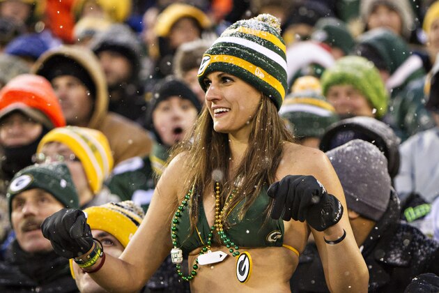 GREEN BAY, WI - DECEMBER 22:  Fan of the Green Bay Packers dances in the snow in her bathing suit during a game against the Pittsburgh Steelers at Lambeau Field on December 22, 2013 in Green Bay, Wisconsin.  (Photo by Wesley Hitt/Getty Images)