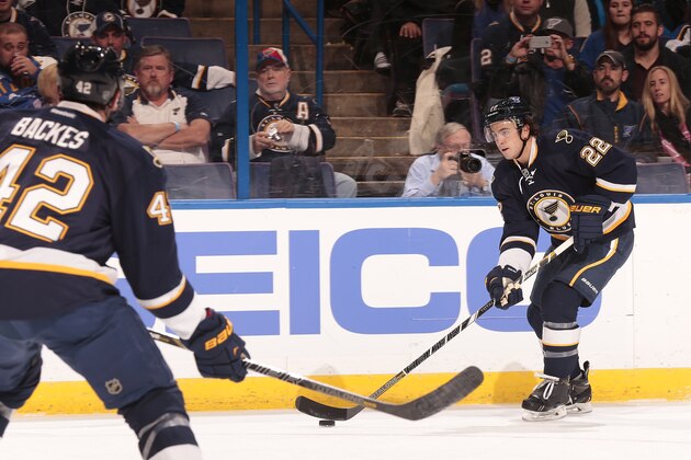 ST. LOUIS, MO - DECEMBER 07:  Kevin Shattenkirk #22 of the St. Louis Blues handles the puck against the Anaheim Ducks during an NHL game on December 7, 2013 at Scottrade Center in St. Louis, Missouri. (Photo by Mark Buckner/NHLI via Getty Images)