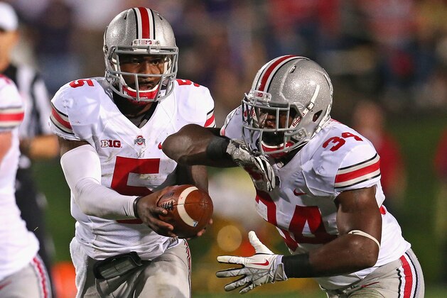 EVANSTON, IL - OCTOBER 05: Braxton Miller #5 of the Ohio State Buckeyes hands off to Carlos Hyde #34 against the Northwestern Wildcats at Ryan Field on October 5, 2013 in Evanston, Illinois. Ohio State defeated Northwestern 40-30. Photo by Jonathan Daniel/Getty Images)