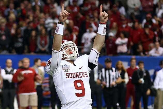 NEW ORLEANS, LA - JANUARY 02:  Trevor Knight #9 of the Oklahoma Sooners reacts after a touchdown against the Alabama Crimson Tide during the Allstate Sugar Bowl at the Mercedes-Benz Superdome on January 2, 2014 in New Orleans, Louisiana.  (Photo by Streeter Lecka/Getty Images)