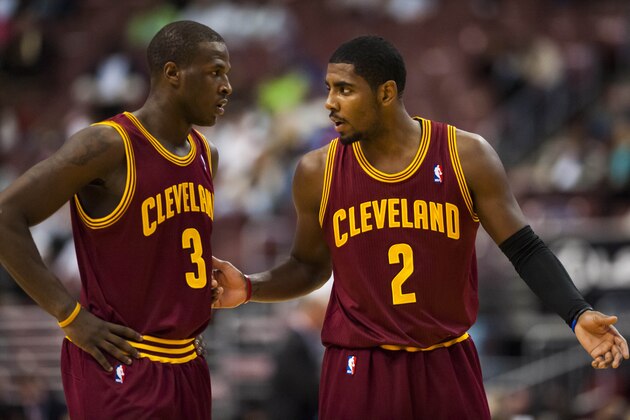 Oct 17, 2012; Philadelphia, PA, USA; Cleveland Cavaliers guard Kyrie Irving (2) talks with guard Dion Waiters (3) during the second quarter against the Philadelphia 76ers at the Wachovia Center. Mandatory Credit: Howard Smith-USA TODAY Sports
