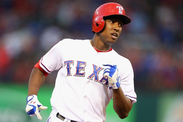 ARLINGTON, TX - AUGUST 30:  Jurickson Profar #13 of the Texas Rangers runs the bases after hitting a homerun against the Minnesota Twins in the third inning at Rangers Ballpark in Arlington on August 30, 2013 in Arlington, Texas.  (Photo by Ronald Martinez/Getty Images)