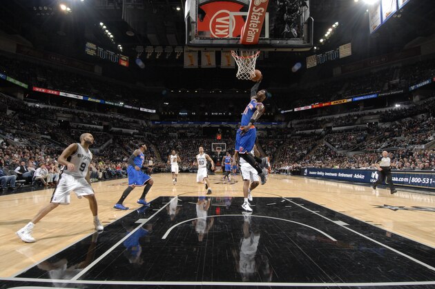 SAN ANTONIO, TX - January 2: Iman Shumpert #21 of the New York Knicks dunks against the San Antonio Spurs at the AT&T Center on January 2, 2014 in San Antonio, Texas. NOTE TO USER: User expressly acknowledges and agrees that, by downloading and or using this photograph, user is consenting to the terms and conditions of the Getty Images License Agreement. Mandatory Copyright Notice: Copyright 2014 NBAE (Photos by D. Clarke Evans/NBAE via Getty Images)
