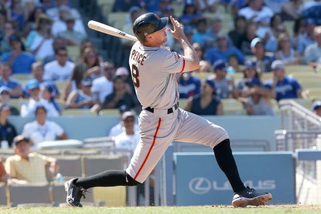 LOS ANGELES, CA - SEPTEMBER 15:  Hunter Pence #8 of the San Francisco Giants hits a two run home run in the sxth inning for his second home run of the game against the Los Angeles Dodgers at Dodger Stadium on September 15, 2013 in Los Angeles, California.  (Photo by Stephen Dunn/Getty Images)