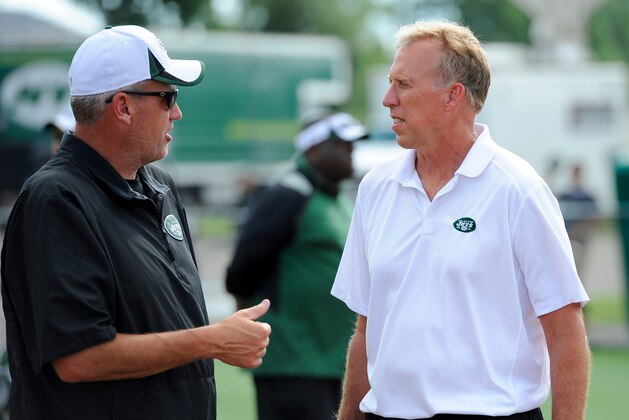 JJul 28, 2013; Cortland, NY, USA; New York Jets head coach Rex Ryan (left) and general manager John Idzik talk following training camp at SUNY Cortland.  Mandatory Credit: Rich Barnes-USA TODAY Sports