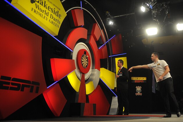 FRIMLEY ENGLAND - JANUARY 06: Jan Dekker of The Netherlands in action during his first round match against Jeffrey De Graaf of The Netherlands on day two of the BDO Lakeside World Professional Darts Championships at Lakeside Country Club on January 06, 2013 in London, England. (Photo by Charlie Crowhurst/Getty Images)