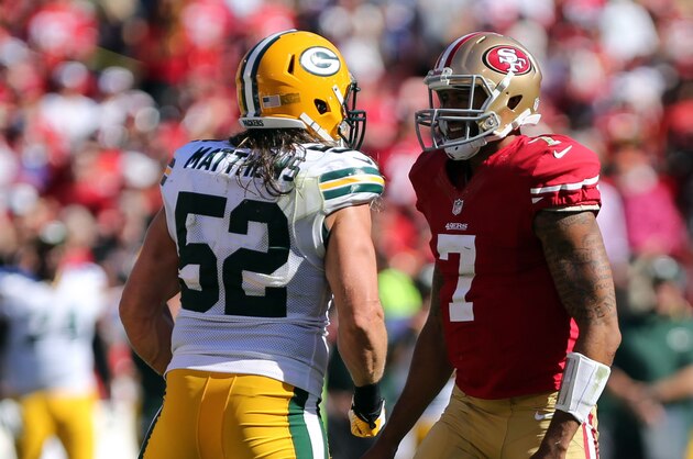 Sep 8, 2013; San Francisco, CA, USA; Green Bay Packers outside linebacker Clay Matthews (52) faces San Francisco 49ers quarterback Colin Kaepernick (7) after the sack during the third quarter at Candlestick Park. The San Francisco 49ers defeated the Green Bay Packers 34-28. Mandatory Credit: Kelley L Cox-USA TODAY Sports