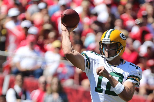 Sep 8, 2013; San Francisco, CA, USA; Green Bay Packers quarterback Aaron Rodgers (12) passes the ball against the San Francisco 49ers during the first quarter at Candlestick Park. Mandatory Credit: Kelley L Cox-USA TODAY Sports