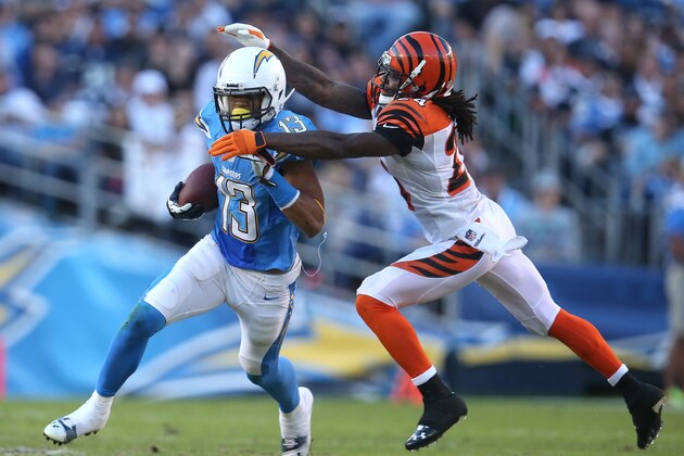 SAN DIEGO, CA - DECEMBER 01: Wide receiver Keenan Allen #13 of the San Diego Chargers gets away from cornerback Adam Jones #2 of the Cincinnati Bengals at Qualcomm Stadium on December 1, 2013 in San Diego, California. The Bengals won 17-10.  (Photo by Stephen Dunn/Getty Images)
