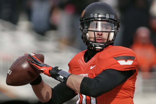 STILLWATER, OK - DECEMBER 7:    Quarterback Clint Chelf #10 of the Oklahoma State Cowboys looks to throw during the game against the Oklahoma Sooners December 7, 2013 at Boone Pickens Stadium in Stillwater, Oklahoma. Oklahoma defeated Oklahoma State 33-24. (Photo by Brett Deering/Getty Images)