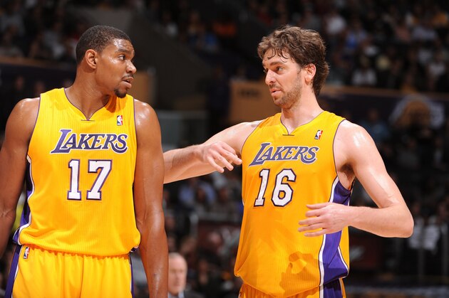 LOS ANGELES, CA - MARCH 16:  Andrew Bynum #17 and Pau Gasol #16 of the Los Angeles Lakers share a word during their game against the Minnesota Timberwolves at Staples Center on March 16, 2012 in Los Angeles, California. NOTE TO USER: User expressly acknowledges and agrees that, by downloading and/or using this Photograph, user is consenting to the terms and conditions of the Getty Images License Agreement. Mandatory Copyright Notice: Copyright 2012 NBAE (Photo by Andrew D. Bernstein/NBAE via Getty Images)