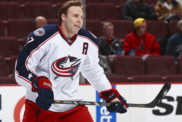 VANCOUVER, BC - NOVEMBER 22:  Jack Johnson #7 of the Columbus Blue Jackets skates up ice during their NHL game against the Vancouver Canucks at Rogers Arena on November 22, 2013 in Vancouver, British Columbia, Canada.  Vancouver won 6-2. (Photo by Jeff Vinnick/NHLI via Getty Images)