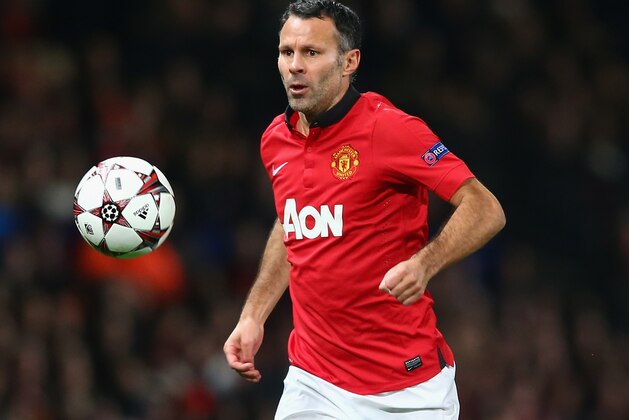 MANCHESTER, ENGLAND - DECEMBER 10:   Ryan Giggs of Manchester United in action during the UEFA Champions League Group A match between Manchester United and Shakhtar Donetsk at Old Trafford on December 10, 2013 in Manchester, England.  (Photo by Michael Steele/Getty Images)