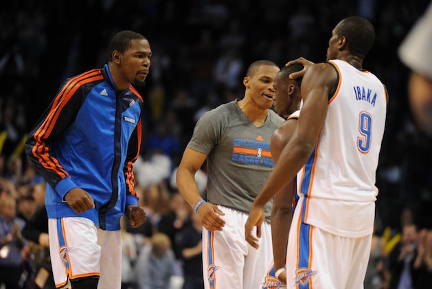 Nov 27, 2013; Oklahoma City, OK, USA; Oklahoma City Thunder small forward Kevin Durant (35) and point guard Russell Westbrook (0) and Thunder power forward Serge Ibaka (9) congratulate Thunder point guard Reggie Jackson (15) in a break in action against the San Antonio Spurs at Chesapeake Energy Arena. Mandatory Credit: Mark D. Smith-USA TODAY Sports Nov 27, 2013; Oklahoma City, OK, USA; Oklahoma City Thunder small forward Kevin Durant (35) and point guard Russell Westbrook (0) and Thunder power forward Serge Ibaka (9) congratulate Thunder point guard Reggie Jackson (15) in a break in action against the San Antonio Spurs at Chesapeake Energy Arena. Mandatory Credit: Mark D. Smith-USA TODAY Sports