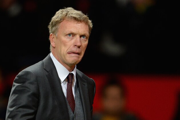 MANCHESTER, ENGLAND - JANUARY 01: Manchester United Manager David Moyes reacts at the end of the Barclays Premier League match between Manchester United and Tottenham Hotspur at Old Trafford on January 1, 2014 in Manchester, England. (Photo by Michael Regan/Getty Images) MANCHESTER, ENGLAND - JANUARY 01: Manchester United Manager David Moyes reacts at the end of the Barclays Premier League match between Manchester United and Tottenham Hotspur at Old Trafford on January 1, 2014 in Manchester, England. (Photo by Michael Regan/Getty Images)