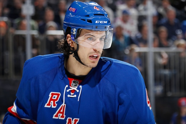 NEW YORK, NY - DECEMBER 20: Michael Del Zotto #4 of the New York Rangers looks on during a break in the action against the New York Islanders at Madison Square Garden on December 20, 2013 in New York City. The New York Islanders won 5-3. (Photo by Scott Levy/NHLI via Getty Images) NEW YORK, NY - DECEMBER 20: Michael Del Zotto #4 of the New York Rangers looks on during a break in the action against the New York Islanders at Madison Square Garden on December 20, 2013 in New York City. The New York Islanders won 5-3. (Photo by Scott Levy/NHLI via Getty Images)