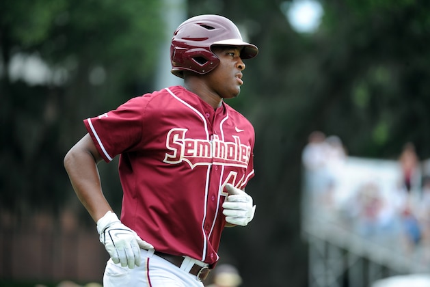Jun 8, 2013; Tallahassee, FL, USA; Florida State Seminoles right fielder Jameis Winston (44) is walked to first base in the game against the Indiana Hoosiers during the Tallahassee super regional of the 2013 NCAA baseball tournament at Dick Howser Stadium. Mandatory Credit: Melina Vastola-USA TODAY Sports