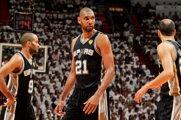 MIAMI, FL - JUNE 9: Tony Parker #9, Tim Duncan #21 and Manu Ginobili #20 of the San Antonio Spurs wait to resume play against the Miami Heat during Game Two of the 2013 NBA Finals on June 9, 2013 at American Airlines Arena in Miami, Florida. NOTE TO USER: User expressly acknowledges and agrees that, by downloading and or using this photograph, User is consenting to the terms and conditions of the Getty Images License Agreement. Mandatory Copyright Notice: Copyright 2013 NBAE (Photo by Issac Baldizon/NBAE via Getty Images)
