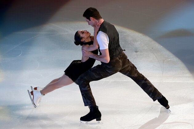 EAST RUTHERFORD, NJ - DECEMBER 11:  Marissa Castelli and Simon Shnapir perform during the P&G Wal-Mart 'Tribute to American Legends of the Ice' at Izod Center on December 11, 2013 in East Rutherford, New Jersey.  (Photo by Elsa/Getty Images)