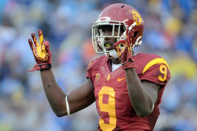 PASADENA, CA - NOVEMBER 17:  Marqise Lee #9 of the USC Trojans reacts to the crowd during a 38-28 loss to the UCLA Bruins at Rose Bowl on November 17, 2012 in Pasadena, California.  (Photo by Harry How/Getty Images)
