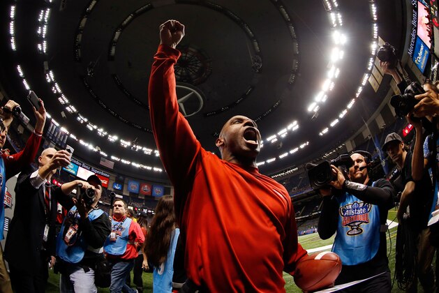 NEW ORLEANS, LA - JANUARY 02:  Head coach Charlie Strong of the Louisville Cardinals celebrates after they defeated the Florida Gators 33 to 23 in the Allstate Sugar Bowl at Mercedes-Benz Superdome on January 2, 2013 in New Orleans, Louisiana.  (Photo by Chris Graythen/Getty Images)