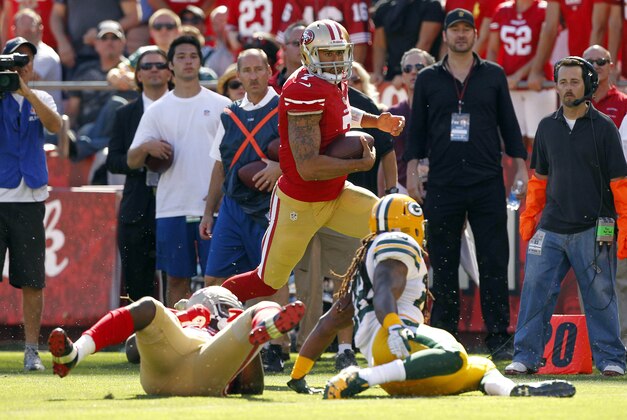 Sep 8, 2013; San Francisco, CA, USA; San Francisco 49ers quarterback Colin Kaepernick (7) runs the ball against the Green Bay Packers in the third quarter at Candlestick Park. The 49ers defeated the Packers 34-28. Mandatory Credit: Cary Edmondson-USA TODAY Sports Sep 8, 2013; San Francisco, CA, USA; San Francisco 49ers quarterback Colin Kaepernick (7) runs the ball against the Green Bay Packers in the third quarter at Candlestick Park. The 49ers defeated the Packers 34-28. Mandatory Credit: Cary Edmondson-USA TODAY Sports
