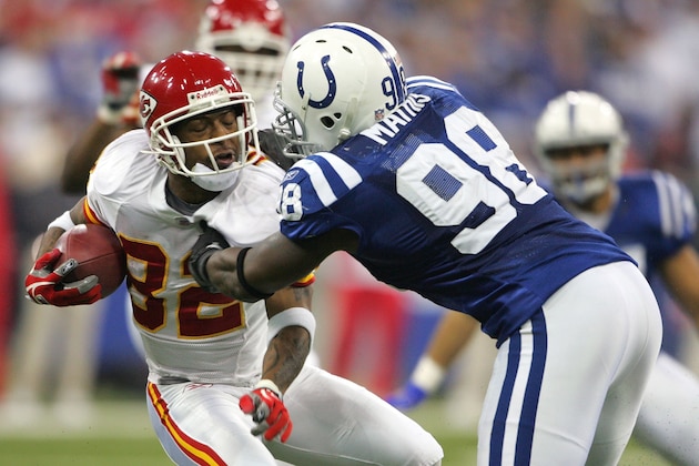INDIANAPOLIS - JANUARY 06:  Dante Hall #82 of the Kansas City Chiefs is tackled by Robert Mathis #98 of the Indianapolis Colts during their AFC Wild Card Playoff Game January 6, 2007 at RCA Dome in Indianapolis, Indiana. The Colts won 23-8.  (Photo by Andy Lyons/Getty Images)
