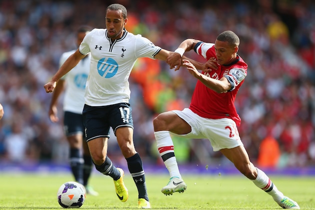 LONDON, ENGLAND - SEPTEMBER 01:  Andros Townsend of Tottenham Hotspur is challenged by Kieran Gibbs of Arsenal during the Barclays Premier League match between Arsenal and Tottenham Hotspur at Emirates Stadium on September 01, 2013 in London, England.  (Photo by Clive Mason/Getty Images)