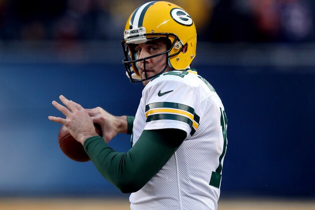 CHICAGO, IL - DECEMBER 29:  Quarterback Aaron Rodgers #12 of the Green Bay Packers warms up prior to a game against the Chicago Bears at Soldier Field on December 29, 2013 in Chicago, Illinois.  (Photo by Jonathan Daniel/Getty Images)