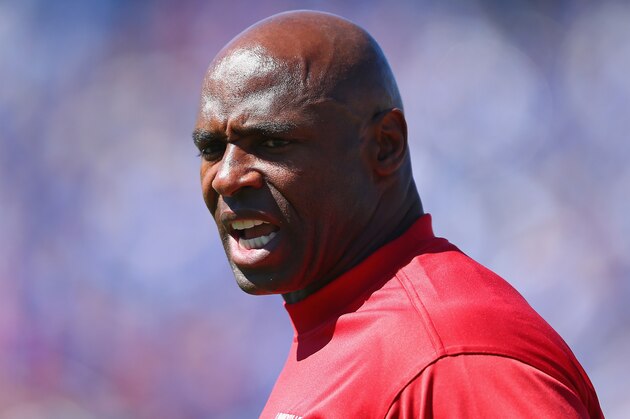 LEXINGTON, KY - SEPTEMBER 14: Charlie Strong the head coach of the Louisville Cardinals gives instructions to his team during the game against the Kentucky Wildcats at Commonwealth Stadium on September 14, 2013 in Lexington, Kentucky.  (Photo by Andy Lyons/Getty Images)