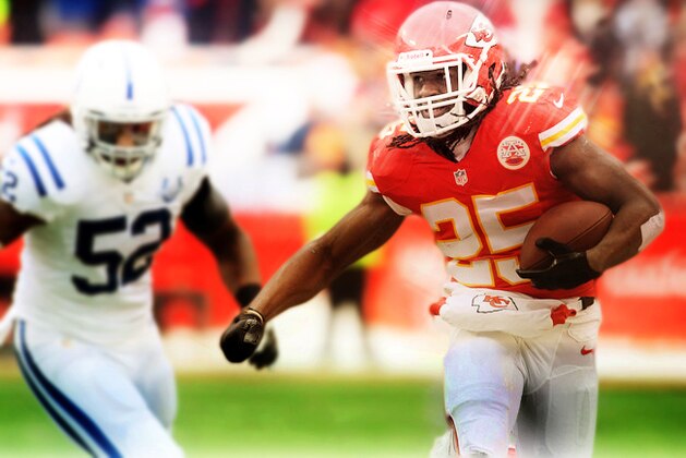 Dec 22, 2013; Kansas City, MO, USA; Kansas City Chiefs running back Jamaal Charles (25) runs the ball as Indianapolis Colts inside linebacker Kelvin Sheppard (52) attempts the tackle during the first half at Arrowhead Stadium. Mandatory Credit: Denny Medley-USA TODAY Sports