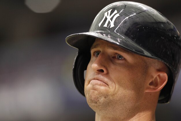 Aug 25, 2013; St. Petersburg, FL, USA; New York Yankees center fielder Brett Gardner (11) on deck to bat against the Tampa Bay Rays at Tropicana Field. Mandatory Credit: Kim Klement-USA TODAY Sports