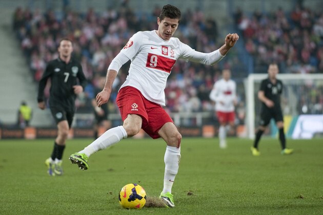 POZNAN, POLAND - NOVEMBER 19: Poland's Robert Lewandowski controls the ball during the International friendly match between Poland and Ireland at the Inea Stadium on November 19, 2013 in Poznan, Poland.  (Photo by Adam Nurkiewicz/Getty Images)