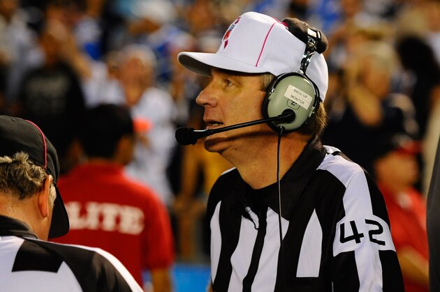 October 15, 2012; San Diego, CA, USA; NFL referee Jeff Triplette reviews a play during the San Diego Chargers game against the Denver Broncos at Qualcomm Stadium. The Broncos won 35-24. Mandatory Credit: Christopher Hanewinckel-USA TODAY Sports