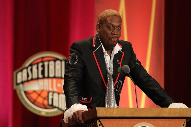 SPRINGFIELD, MA - AUGUST 12:   Dennis Rodman gestures during the Basketball Hall of Fame Enshrinement Ceremony at Symphony Hall on August 12, 2011 in Springfield, Massachusetts. (Photo by Jim Rogash/Getty Images)