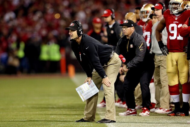 SAN FRANCISCO, CA - DECEMBER 23:  Head coach Jim Harbaugh of the San Francisco 49ers looks on against the Atlanta Falcons during a game at Candlestick Park on December 23, 2013 in San Francisco, California.  (Photo by Stephen Dunn/Getty Images)