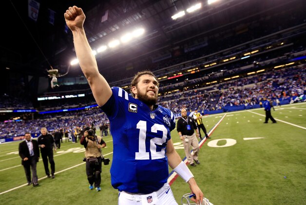 INDIANAPOLIS, IN - JANUARY 04: Quarterback Andrew Luck #12 of the Indianapolis Colts celebrates after defeating the Kansas City Chiefs 45-44 in a Wild Card Playoff game at Lucas Oil Stadium on January 4, 2014 in Indianapolis, Indiana.  (Photo by Rob Carr/Getty Images)