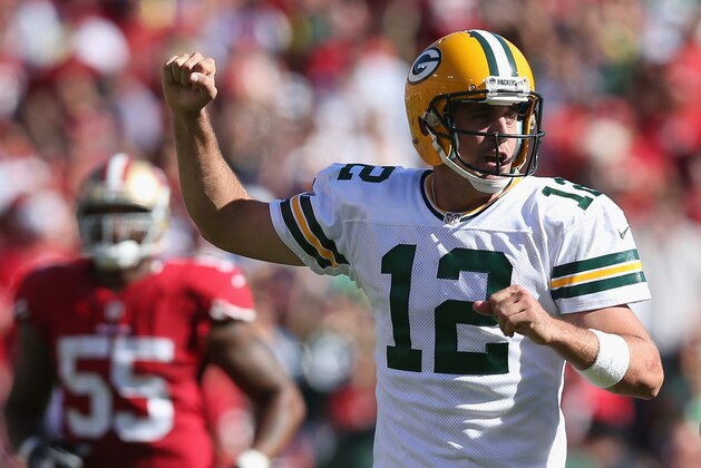 SAN FRANCISCO, CA - SEPTEMBER 08:  Quarterback Aaron Rodgers #12 of the Green Bay Packers celebrates against the San Francisco 49ers at Candlestick Park on September 8, 2013 in San Francisco, California.  (Photo by Jeff Gross/Getty Images)