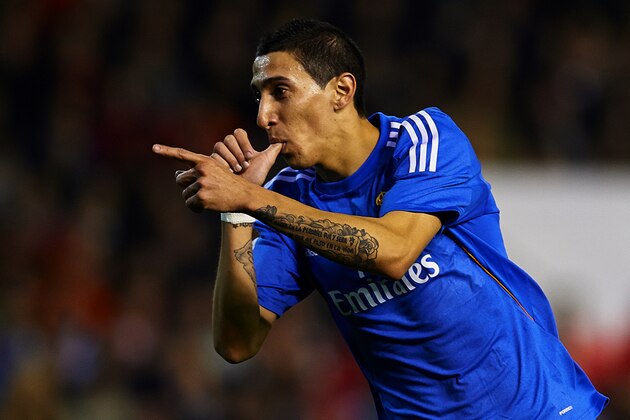 VALENCIA, SPAIN - DECEMBER 22:  Angel Di Maria of Real Madrid celebrates after scoring the opening goal during the La Liga match between Valencia CF and Real Madrid CF at Estadio Mestalla on December 22, 2013 in Valencia, Spain.  (Photo by Manuel Queimadelos Alonso/Getty Images)