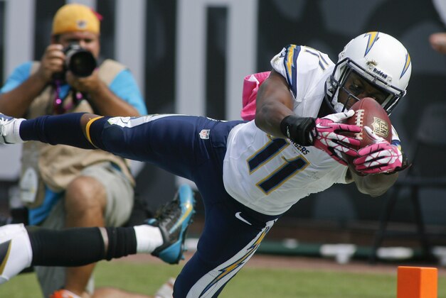 Oct 20, 2013; Jacksonville, FL, USA; San Diego Chargers wide receiver Eddie Royal (11) dives for a touchdown in the second quarter of their game against the Jacksonville Jaguars at EverBank Field. Mandatory Credit: Phil Sears-USA TODAY Sports
